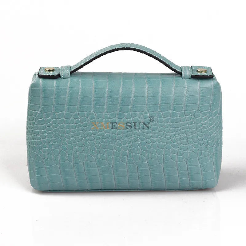 EtherealBe luxurious faux crocodile makeup bag in teal with a stylish handle and textured design