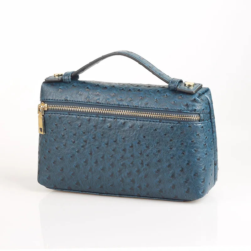 EtherealBe luxurious faux crocodile makeup bag in blue with a stylish design and zipper closure