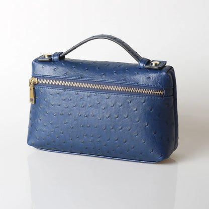 EtherealBe luxurious faux crocodile makeup bag in blue with a sleek design and zipper closure