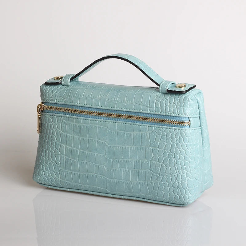 EtherealBe luxurious faux crocodile makeup bag in light blue with a secure zipper and stylish handle