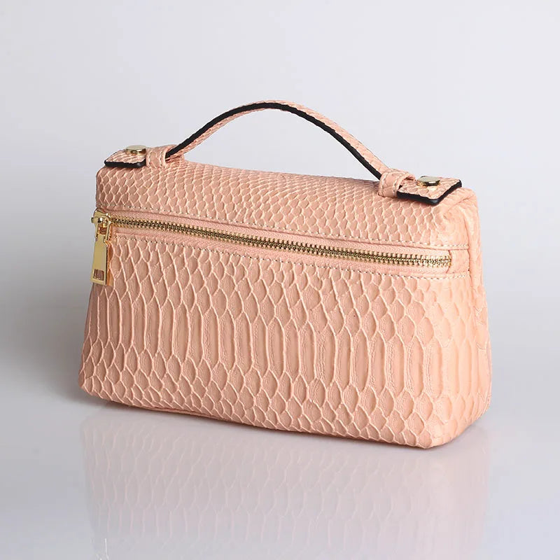 EtherealBe luxurious faux crocodile makeup bag in soft pink with gold zipper and handle