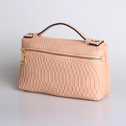 EtherealBe luxurious faux crocodile makeup bag in soft pink with gold zipper and handle