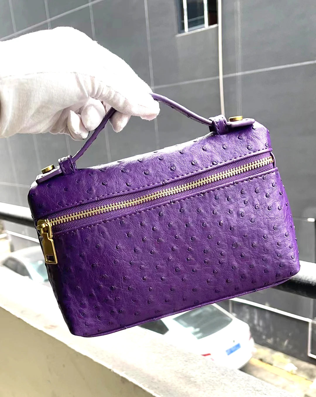 EtherealBe luxurious faux crocodile makeup bag in vibrant purple with a gold zipper and handle