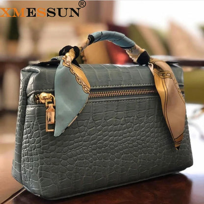 EtherealBe luxurious faux crocodile makeup bag in teal with stylish scarf handle detail