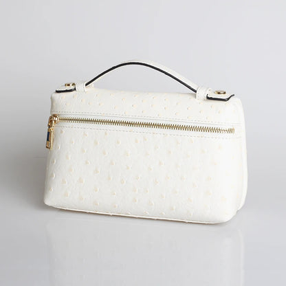 EtherealBe luxurious faux crocodile makeup bag in white with elegant design and gold zipper