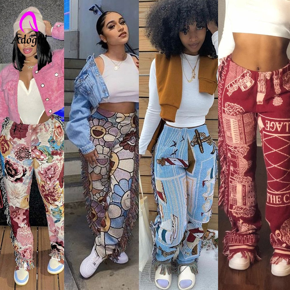 Four models wearing EtherealBe tassel patchwork striped pants in colorful boho prints styled with crop tops