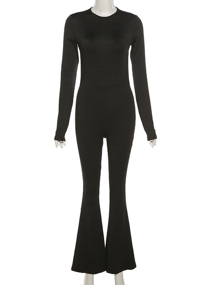 black backless bodycon jumpsuit with long sleeves crew neck fitted waist and flared legs on mannequin