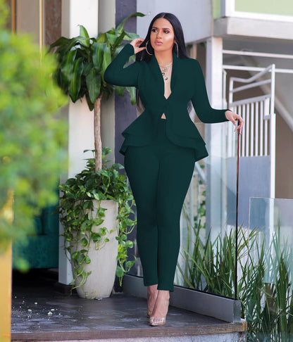 EtherealBe women ruffle blazer pants set in dark green modeled by woman with peplum blazer and slim pants