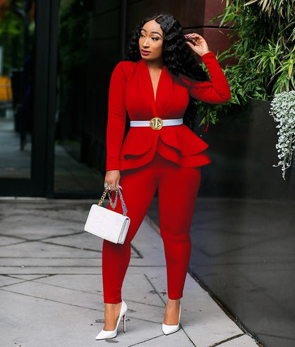 Model wearing red women ruffle blazer pants set with peplum ruffles white belt white heels and handbag