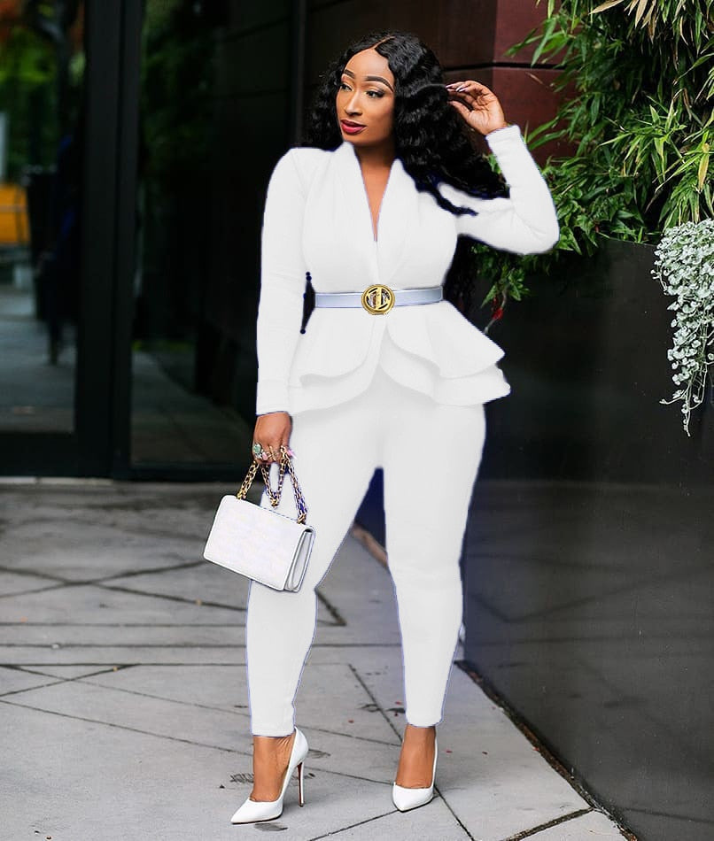 Woman wearing white women ruffle blazer pants set belted peplum with white handbag and heels