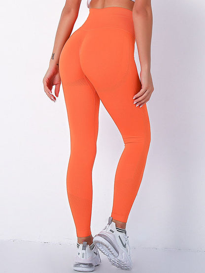 EtherealBe orange high waisted seamless push up gym leggings with butt lift contour and white sneakers