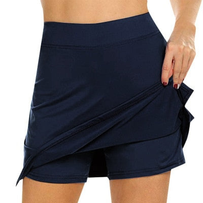 High waist navy athletic skort with inner shorts and stretch fabric for tennis and running casual sports solid color skirt shorts