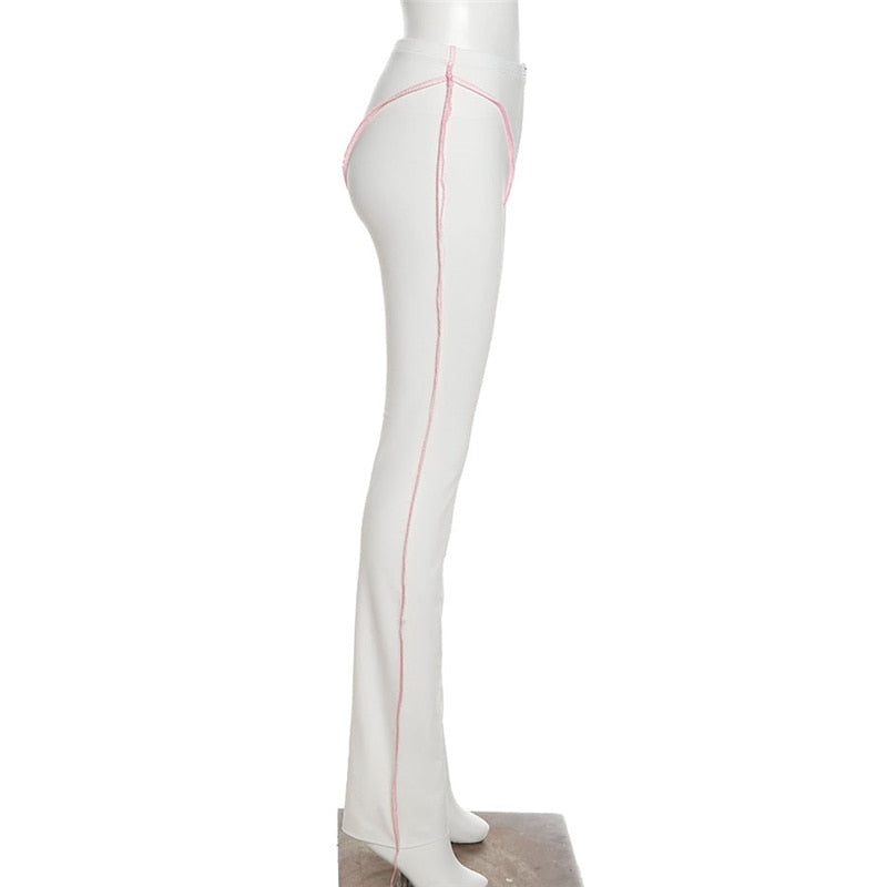 Side view of white athleisure shape wear yoga pants with pink contrast seams high waist on mannequin