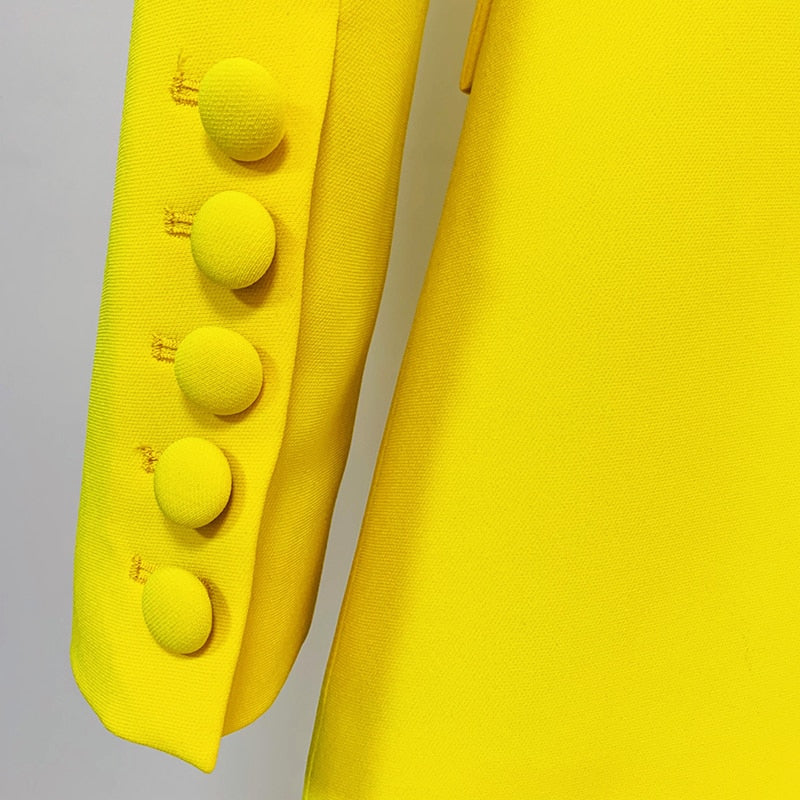 Bright yellow blazer sleeve with covered buttons detail on tailored flare pants blazer set for women