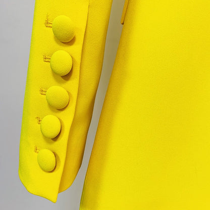 Bright yellow blazer sleeve with covered buttons detail on tailored flare pants blazer set for women