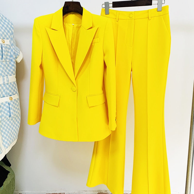 Bright yellow tailored blazer and matching flare pants blazer set for women hung on hangers