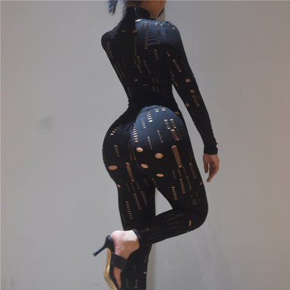 EtherealBe model wearing women's biker style two piece set black cutout long sleeve fitted top and leggings