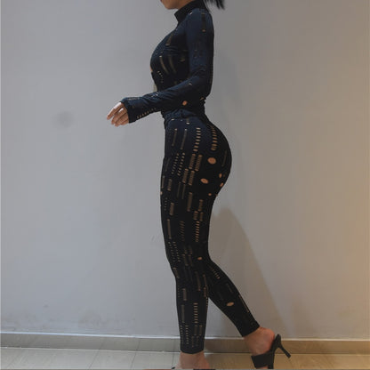 hollow out long sleeve turtleneck outfit black cutout fitted top and leggings side profile with heels
