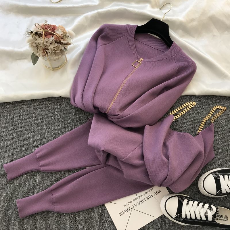 Lavender zip knit sweater and pants outfit for women laid flat with black sneakers and gold zipper detail