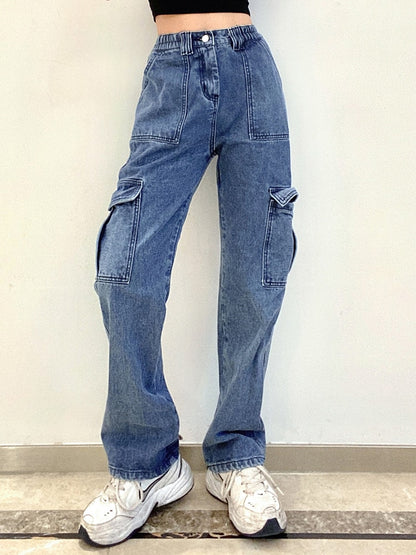 Blue high waist baggy cargo jeans for women with side flap pockets wide legs and elastic waistband