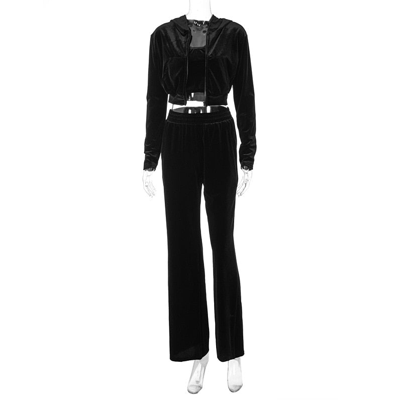 Black sporty velvet crop top 3pc tracksuit for women on mannequin featuring cropped hoodie crop top and wide leg pants
