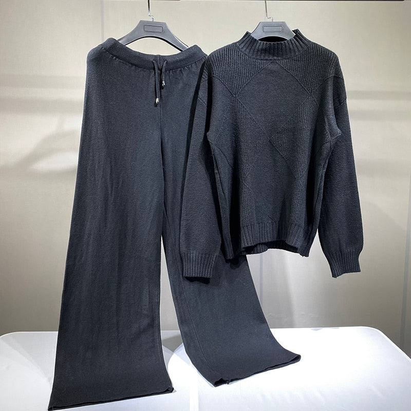 Black knit chic wide leg sweater pants set with drawstring waist ribbed cuffs and mock neck