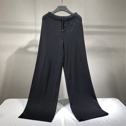 Black knit wide leg pants with drawstring waist on hanger chic wide leg sweater pants set relaxed drape