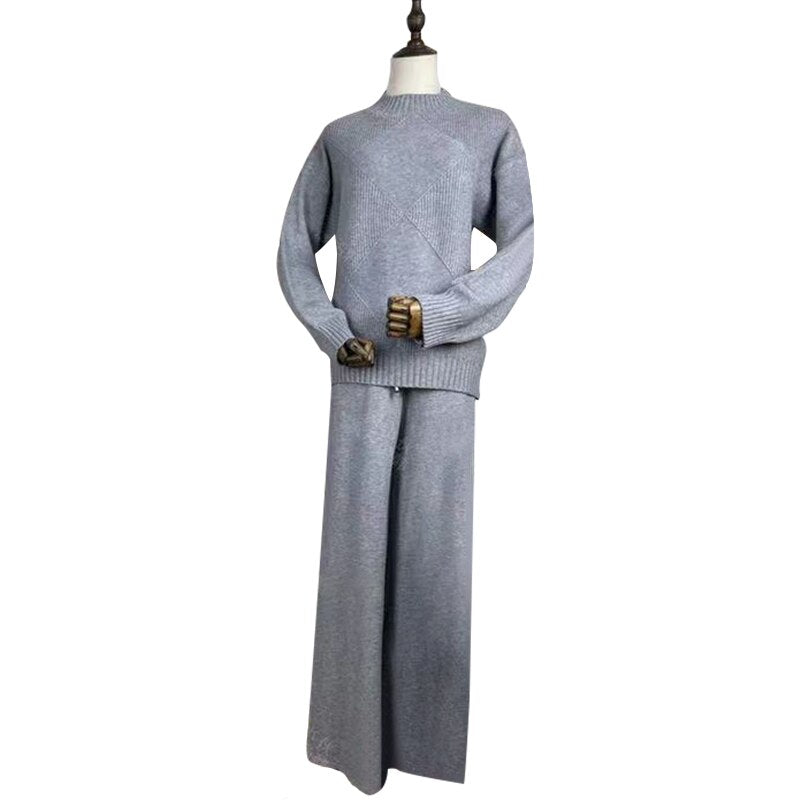 Gray knit crewneck chic wide leg sweater pants set on mannequin ribbed cuffs and relaxed fit