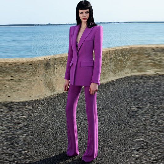 Stylish women's purple blazer and pants suit designed for a chic and modern look