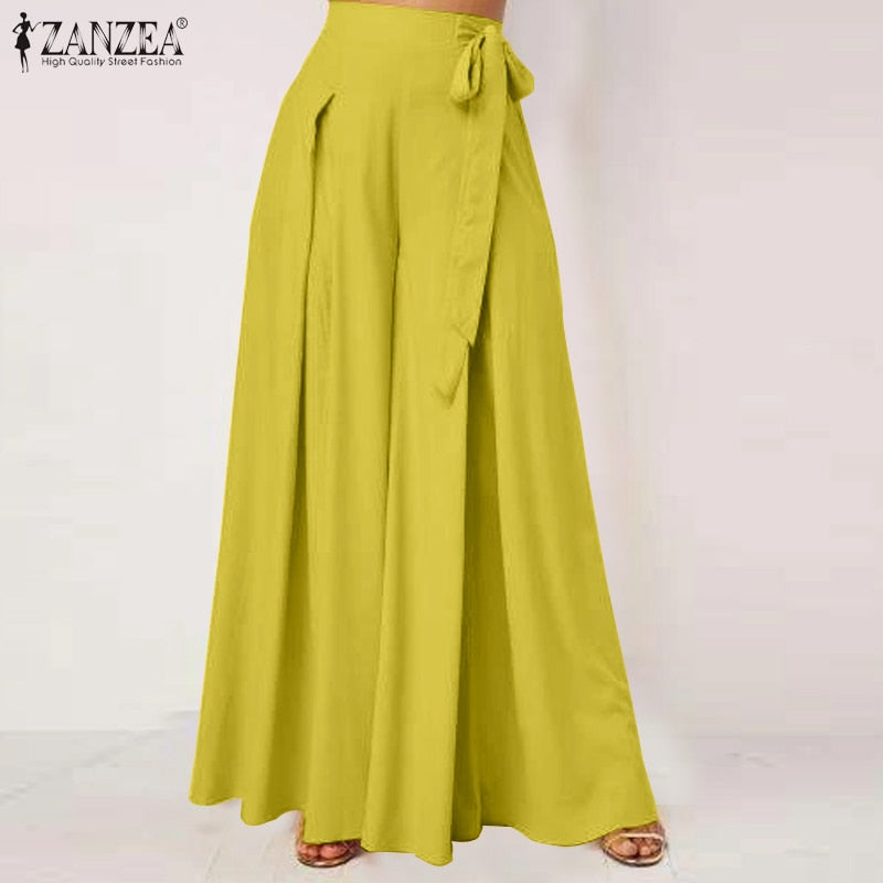 Chic fall flare trousers in vibrant yellow with a tie waist for a stylish autumn look