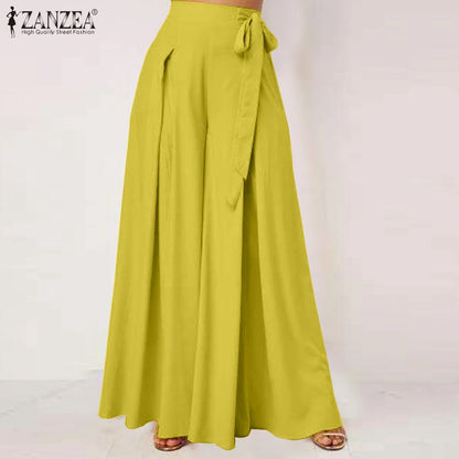 Chic fall flare trousers in vibrant yellow with a tie waist for a stylish autumn look